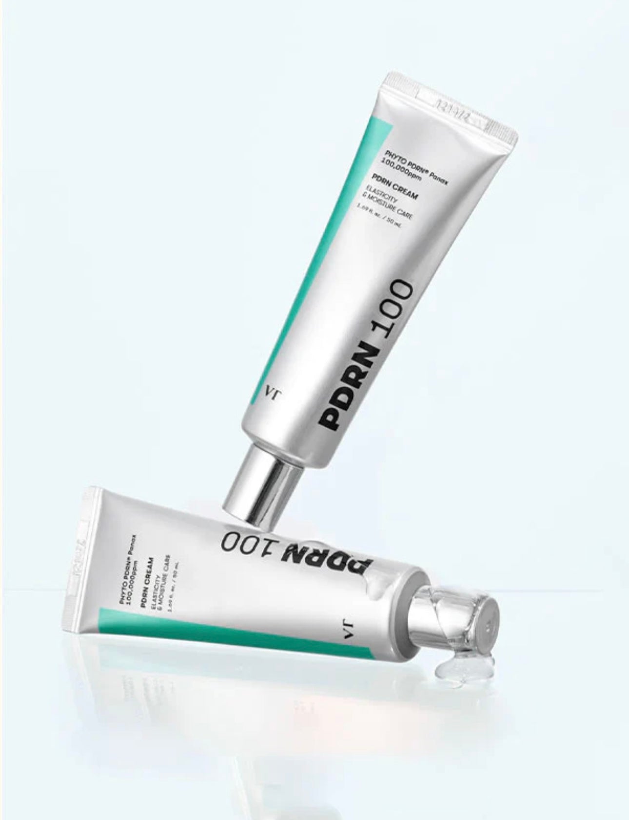 VT PDRN 100 Cream jar, box, and leaflet on a clean background. VT PDRN 100 Cream jar, box, and leaflet on a clean background.