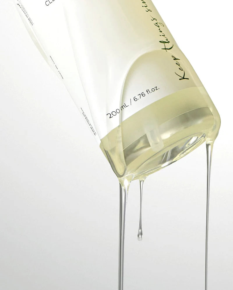 Pump dispensing anua pore control cleansing oil, showing silky slip and easy spread Pump dispensing anua pore control cleansing oil, showing silky slip and easy spread