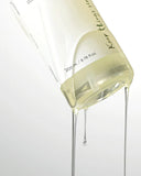 Pump dispensing anua pore control cleansing oil, showing silky slip and easy spread Pump dispensing anua pore control cleansing oil, showing silky slip and easy spread