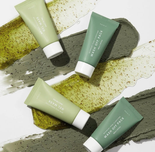 The AXIS-Y Mugwort Pore Pack and New Skin Resolution Gel Mask side-by-side outside the box.