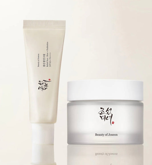 Beauty of Joseon day and night care duo set including Relief Sun sunscreen and Dynasty Cream jar in elegant packaging.