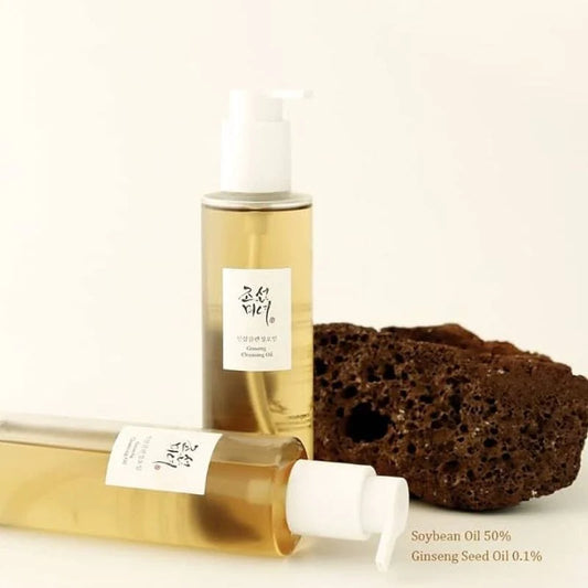 Close-up of ginseng cleansing oil texture being poured — lightweight, silky oil cleanser.