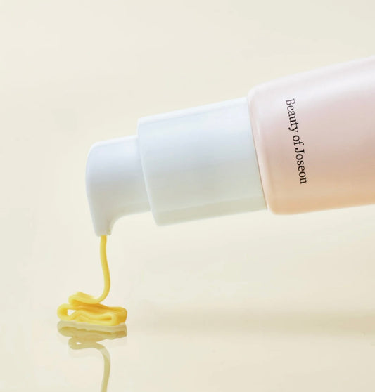 Close-up of Beauty of Joseon Light On Serum Vitamin C tube with dropper