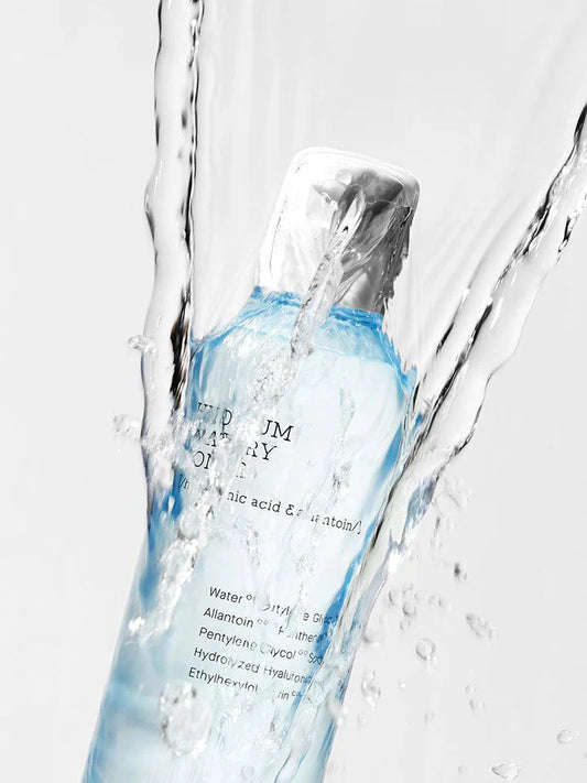 Close-up of the Cosrx Hydrium Watery pump dispenser, ready to release the lightweight watery toner for glowing skin.