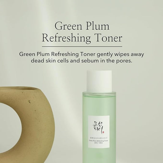 Lifestyle shot: Beauty of Joseon green plum refreshing toner being used in a daily skin care routine.