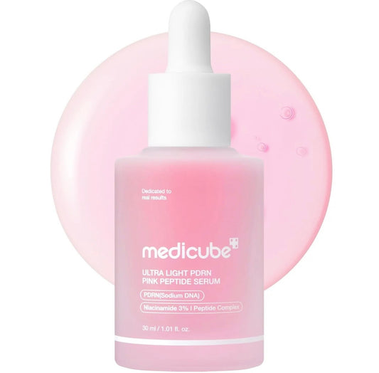 Medicube Ultra Light PDRN Pink Peptide Serum 30ml bottle on a soft pink background, showcasing lightweight glass-skin formula.