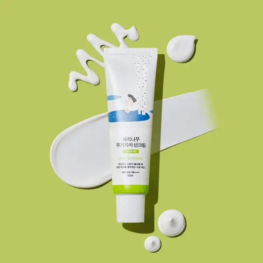 Applying Round Lab Sun Screen for daily UV protection