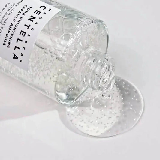 Close-up of Skin1004 Brightening Serum texture with light, hydrating finish