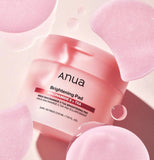 Box of Anua Niacinamide 5 TXA Pads, highlighting its key brightening and pore care benefits.