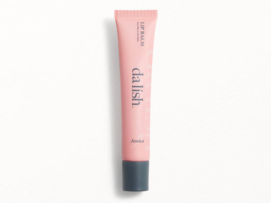 Pink lip balm tube with 'dalish' branding on a white background