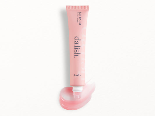 Pink lip balm tube with 'dalish' branding on a white background
