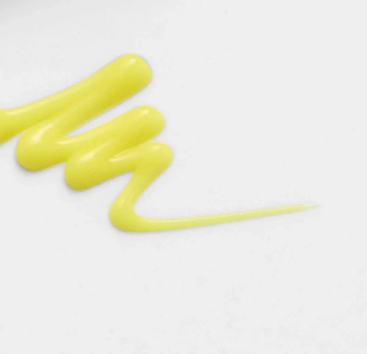 Close-up of the lightweight, amber texture of the Vita A Retinal Shot Booster