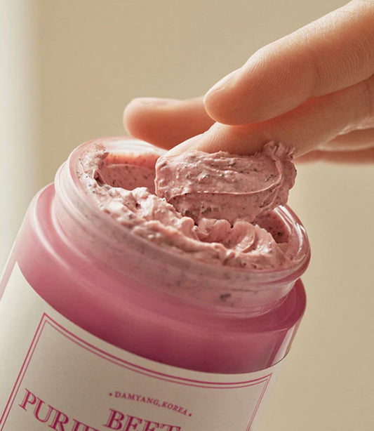 Creamy purple texture of the I’m From beet purifying mask in an open jar