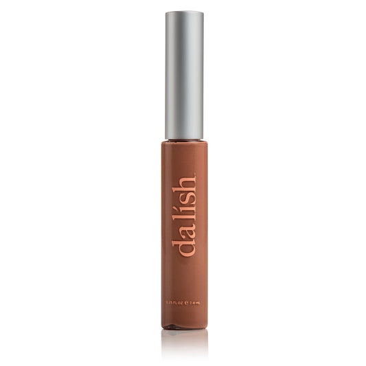Brown cosmetic bottle with silver cap on a white background