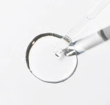 Close-up of the 6 peptide serum's lightweight, easily absorbable texture on the dropper.