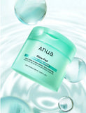 Anua PDRN Hyaluronic Glow Pad 60 pcs jar, showing the dual-texture pads.