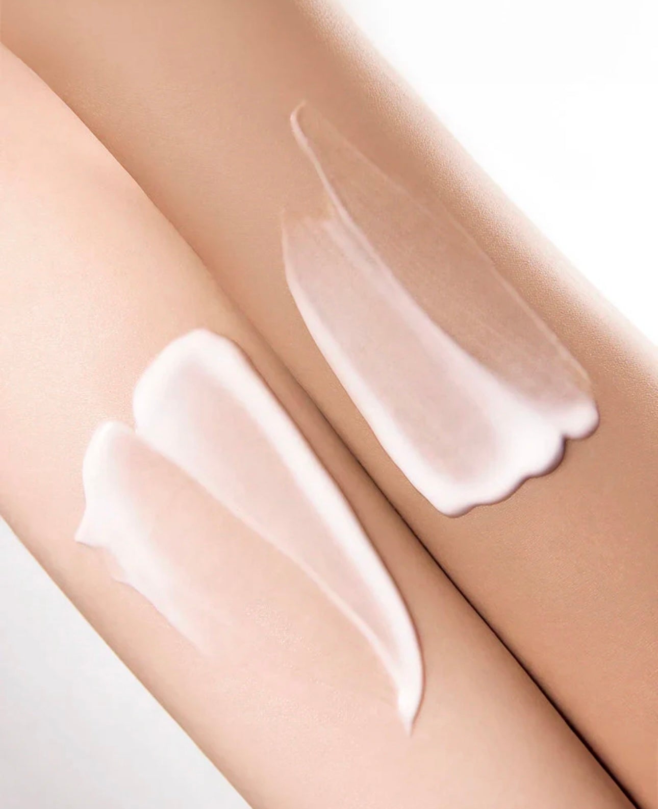 Lightweight, non-greasy texture of the Anua Rice 70 Intensive Moisturizing Milk being applied.