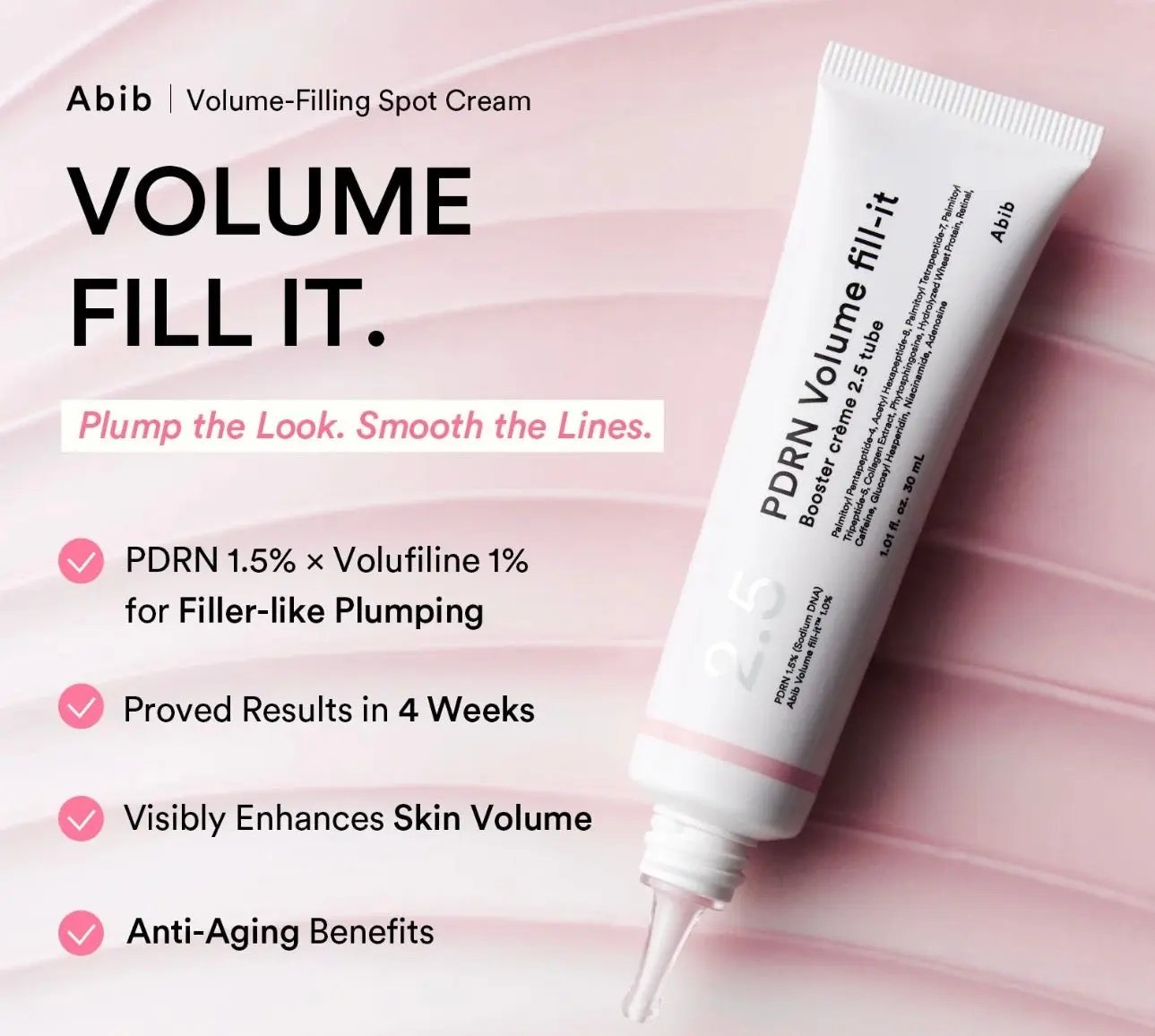 Woman applying Abib PDRN volume booster crème 2.5 tube to her face for firming and hydration.