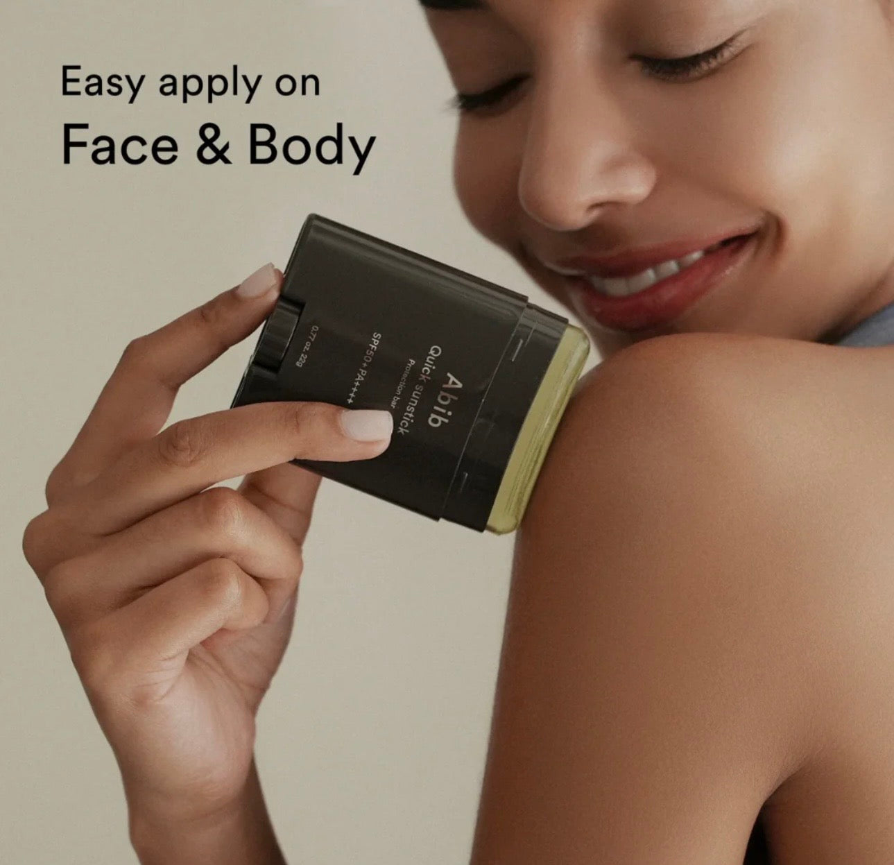 Applying Abib Quick Sunstick Protection Bar directly on skin without white cast for daily sun care.