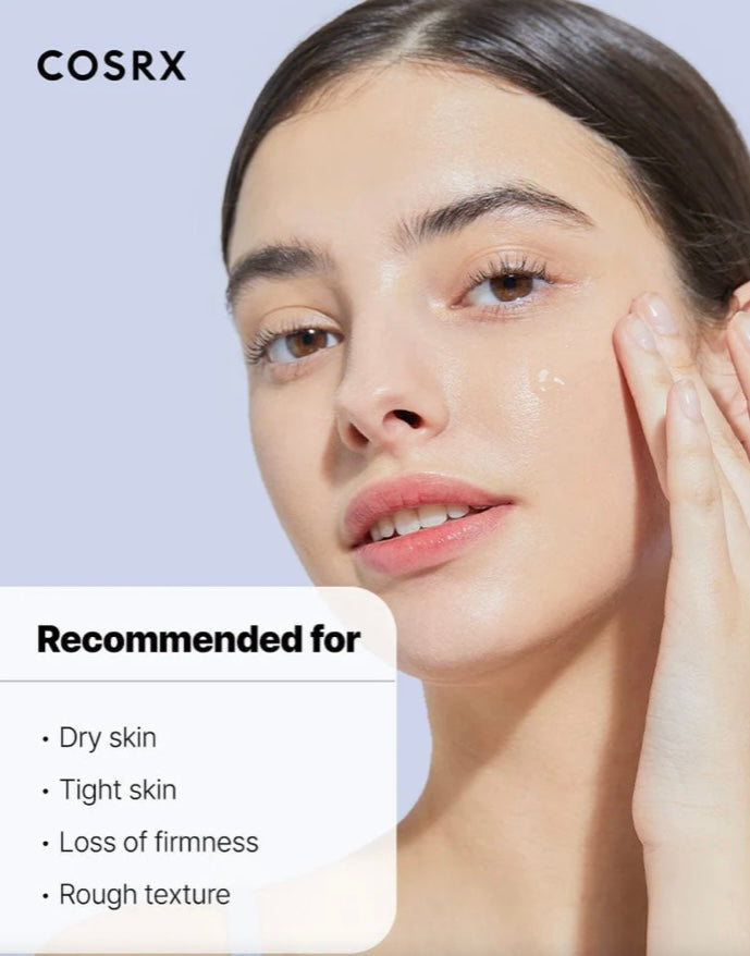 Woman gently patting COSRX The Hyaluronic Acid 3 onto cheeks for radiant skin.