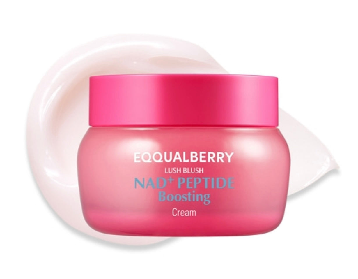 Woman gently applying the Eqqualberry NAD Peptide Boosting Cream to her cheek for hydration and firmness.