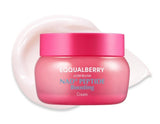 Woman gently applying the Eqqualberry NAD Peptide Boosting Cream to her cheek for hydration and firmness.