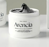 Front view of the Arencia Black Tea & Yuzu Cleanser 120g showing the sleek black and yuzu-themed packaging.