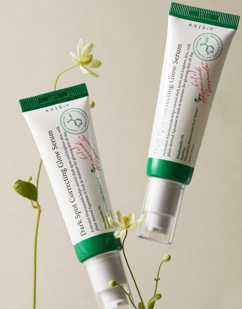 Axis-Y Dark Spot Correcting Glow Serum bottle, showcasing its sleek, minimalist design.