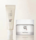 Beauty of Joseon day and night care duo set including Relief Sun sunscreen and Dynasty Cream jar in elegant packaging.