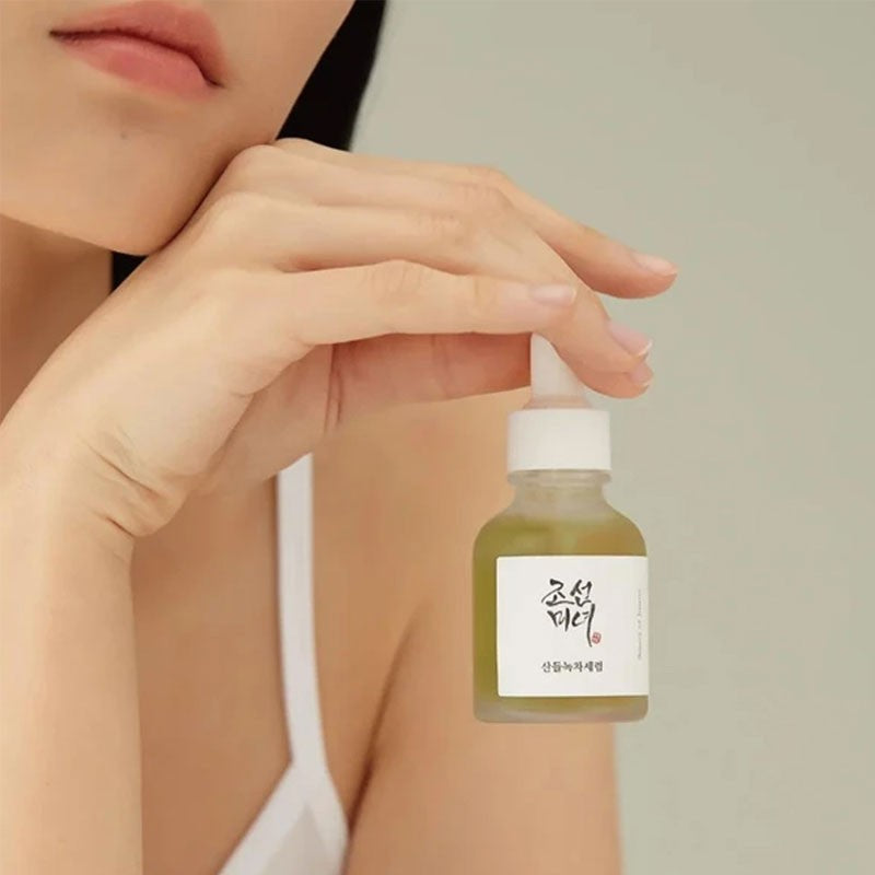 Beauty of Joseon green tea serum ingredients displayed alongside other skincare items, perfect for a calming skincare routine.