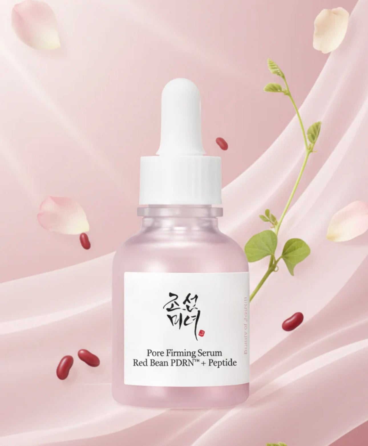 Close up texture shot of the Beauty of Joseon Red Bean PDRN Peptide Firming Serum showing the lightweight, clear, and moisture-rich consistency on a dropper.