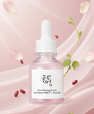 Close up texture shot of the Beauty of Joseon Red Bean PDRN Peptide Firming Serum showing the lightweight, clear, and moisture-rich consistency on a dropper.