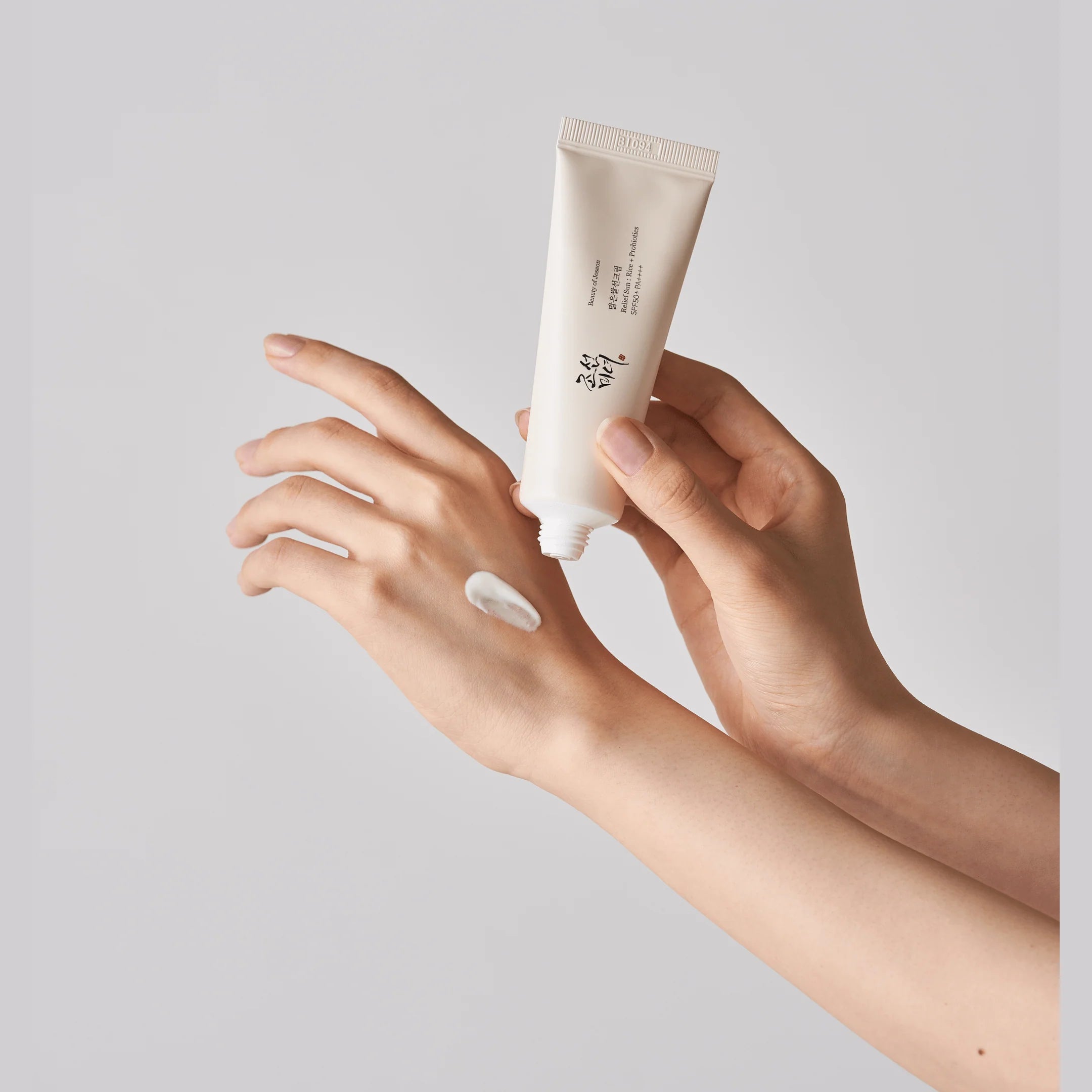 Applying Beauty of Joseon Relief Sun – lightweight Korean sunscreen with no white cast