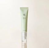 Gently patting the Revive Eye Serum around the eye area.