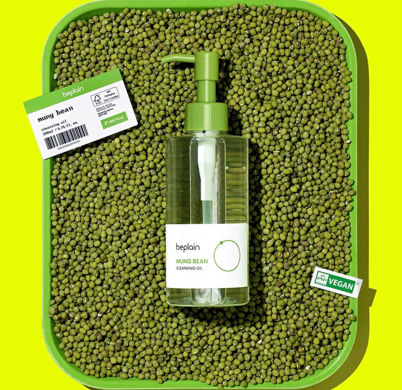 The Beplain Mung Bean Cleansing Oil turning milky white on a hand as water is added, demonstrating the quick emulsification for pore cleansing.