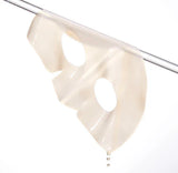 Woman wearing The Alpha Arbutin Discoloration Care Hydrogel Mask showing the clear, cooling gel adhesion and fit.