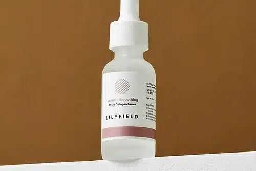 Applying LILYFIELD Wrinkle Smoothing Serum with Phyto Collagen to face, neck and décolleté
