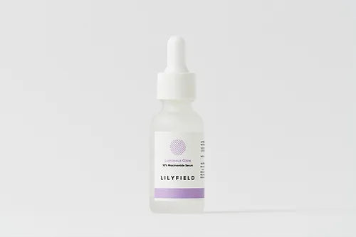 Pipette releasing droplet of LILYFIELD Luminous Serum with Niacinamide