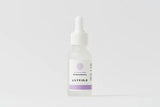 Pipette releasing droplet of LILYFIELD Luminous Serum with Niacinamide