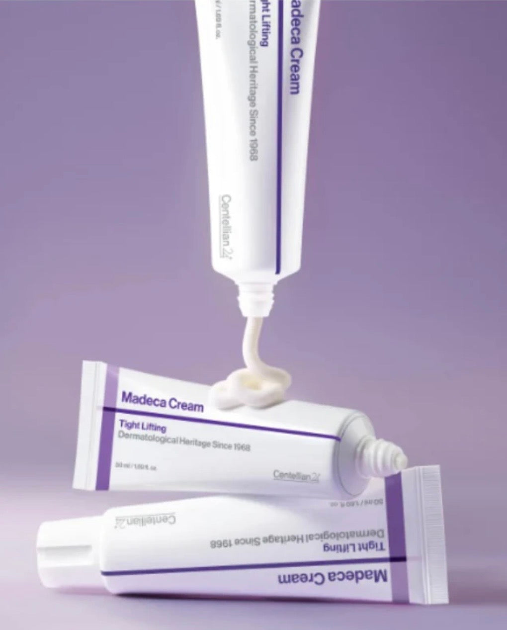 Close-up of the rich, smooth texture of the Centellian24 Madeca Cream Tight Lifting formula on a fingertip.