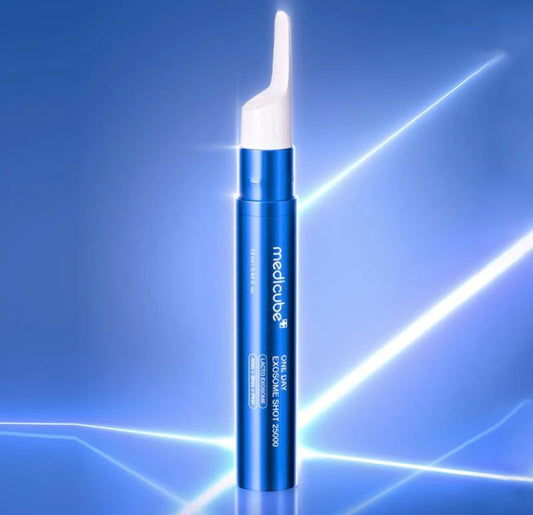 Medicube One Day Exosome Shot Pore Ampoule 25000 13ml bottle standing on white surface with dropper.