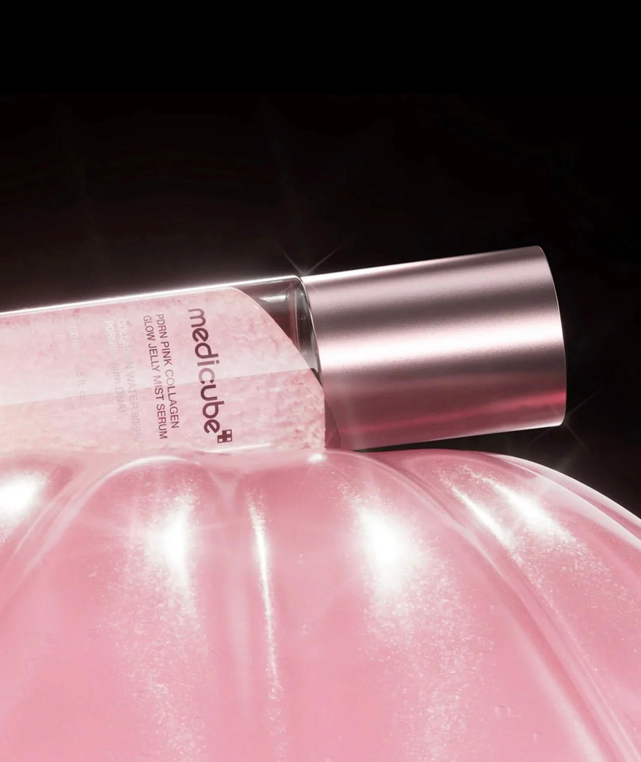 Side angle showing the pink hue of the collagen jelly mist serum.