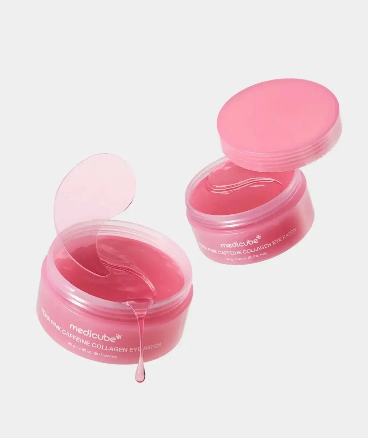 Applying Medicube PDRN pink caffeine eye patch under eye for puffiness