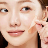 How to use Medicube Red Succinic Acid pads — gently swipe pad across face to exfoliate and reduce oil