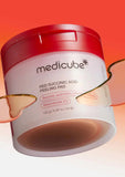 Open jar showing Medicube Red Succinic Acid pads inside (70pcs) — pre-soaked toner pads for pore care