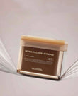 Mediheal Retinol Collagen Pad jar with 100 vegan toner pads and hygiene tweezers on a clean bathroom shelf.