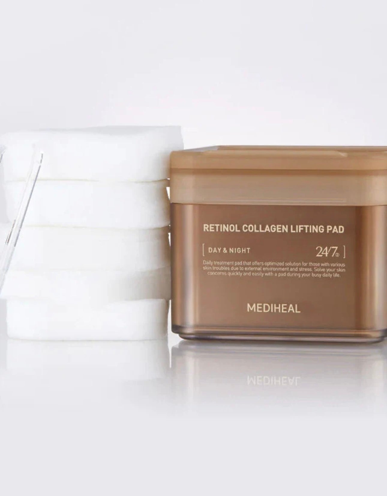 Close up of a Mediheal retinol collagen pad soaked in lifting essence showing the soft, embossed cotton side.