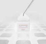 Embossed side of the Mediheal Phyto Enzyme Peeling Pad used for gentle physical exfoliation.