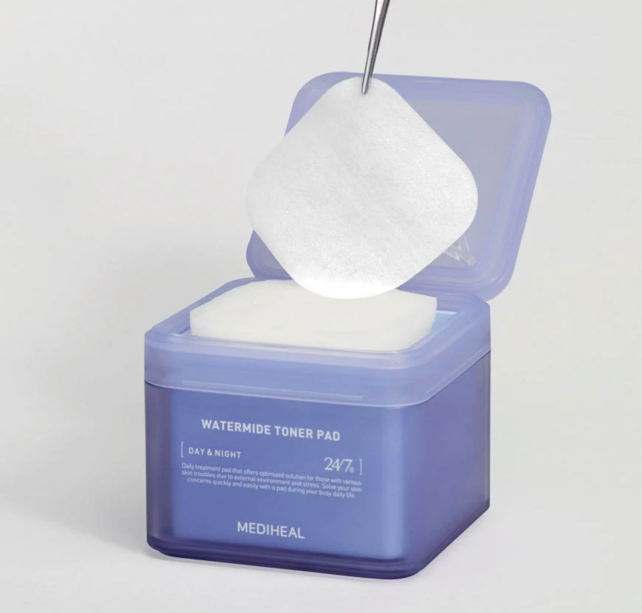 Close up review of Mediheal Watermide pad showing the soft embossed side soaked in hydrating essence.