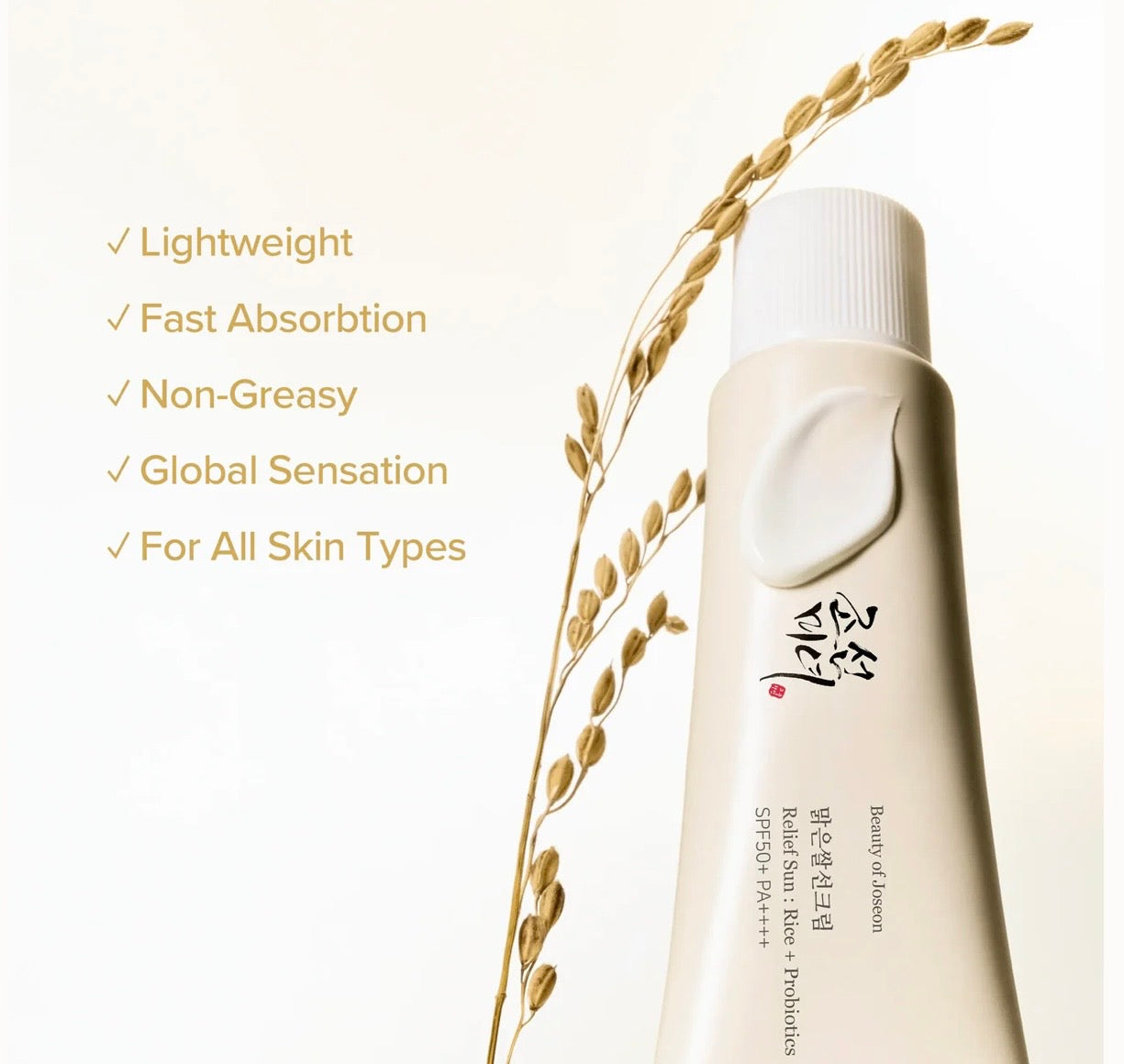 Woman applying Beauty of Joseon day care duo sunscreen for zero white cast dewy skin.